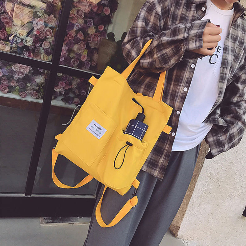 Harajuku yellow canvas handbag with pockets, stylish backpack for students and casual outings.
