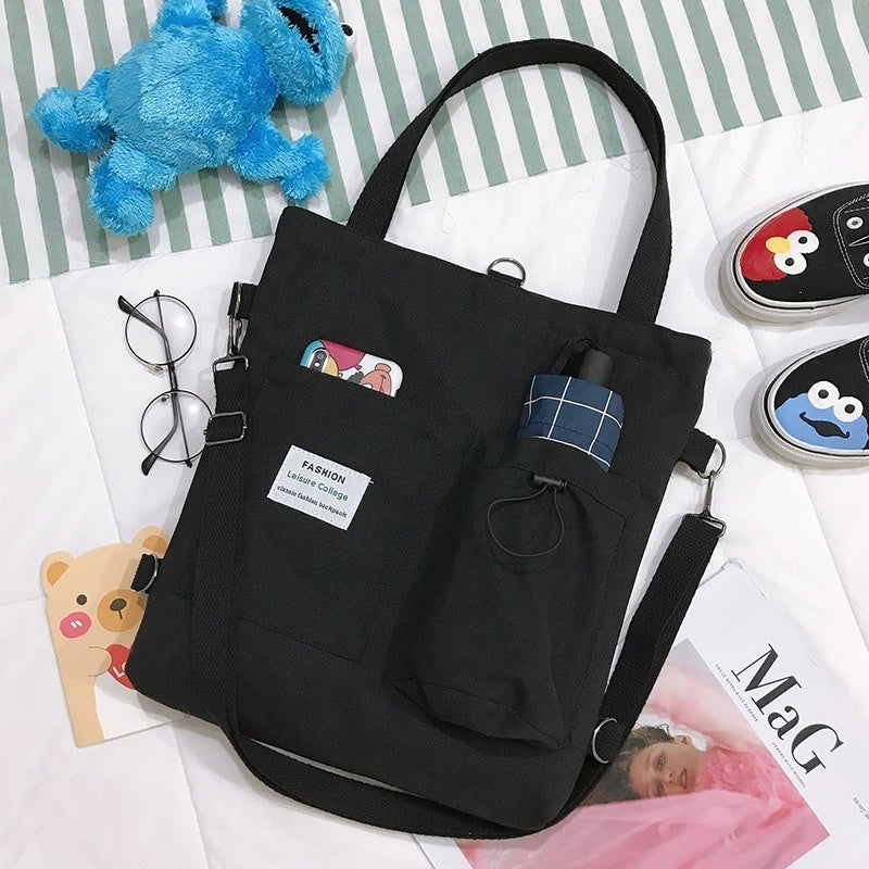 Harajuku canvas handbag with pockets, stylish and practical for students, ideal for school and casual outings.