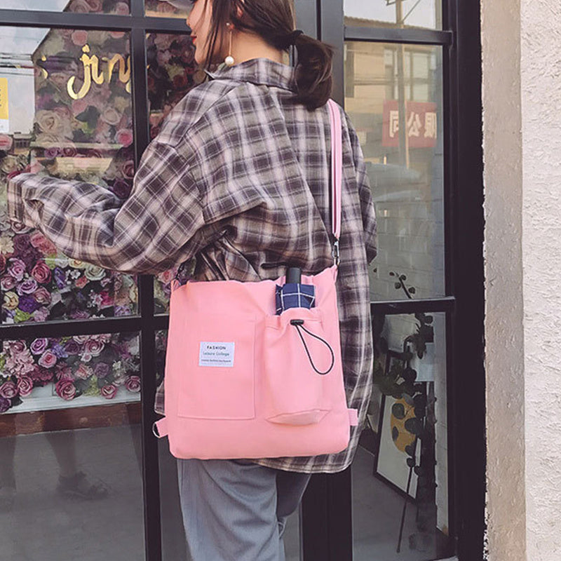 Stylish pink Harajuku canvas handbag with pockets, perfect for students and everyday use.